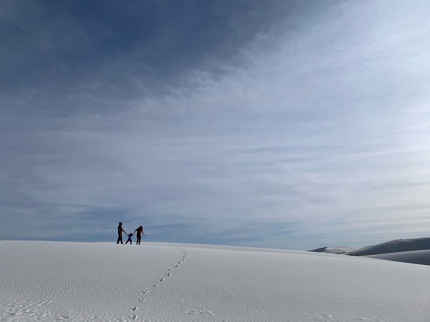 Jesse, Becky, and Vera walking the dunes at White Sands National Park